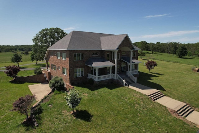1179 County Road 1050, Willow Springs, MO 65793 - exterior space featuring a front lawn, brick siding, stairway, and covered porch