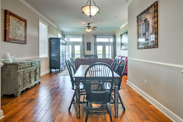 dining area with french doors, ornamental molding, dark hardwood / wood-style flooring, and ceiling fan