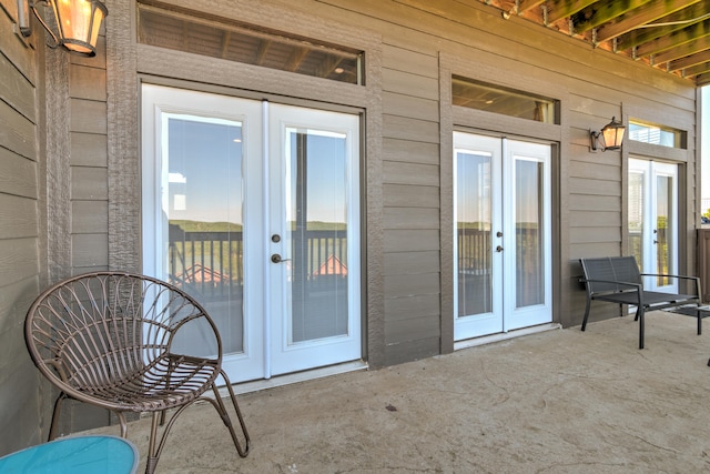 doorway to property featuring french doors and a patio area