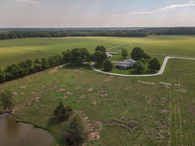 aerial view with a rural view and a water view