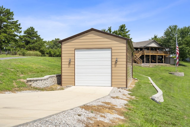 garage featuring a yard