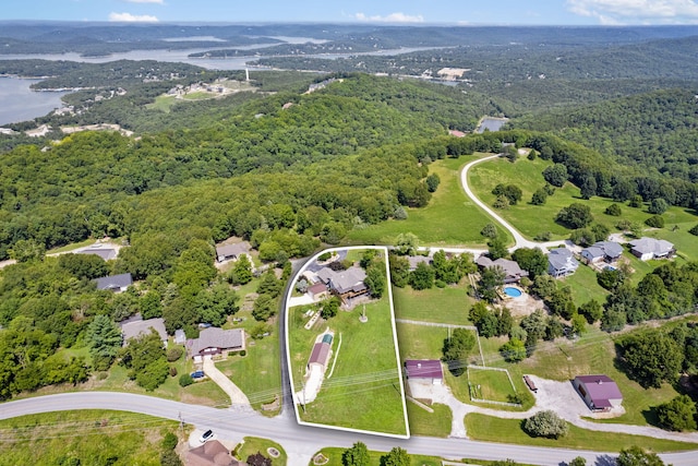 bird's eye view featuring a forest view