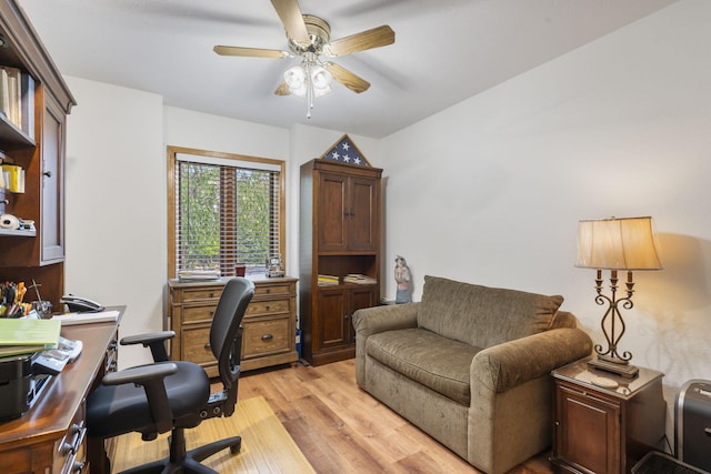 office space featuring ceiling fan and light hardwood / wood-style floors