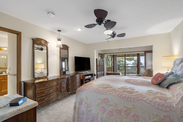 bedroom with light colored carpet, ceiling fan, access to exterior, and ensuite bathroom