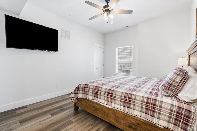 bedroom featuring wood-type flooring and ceiling fan