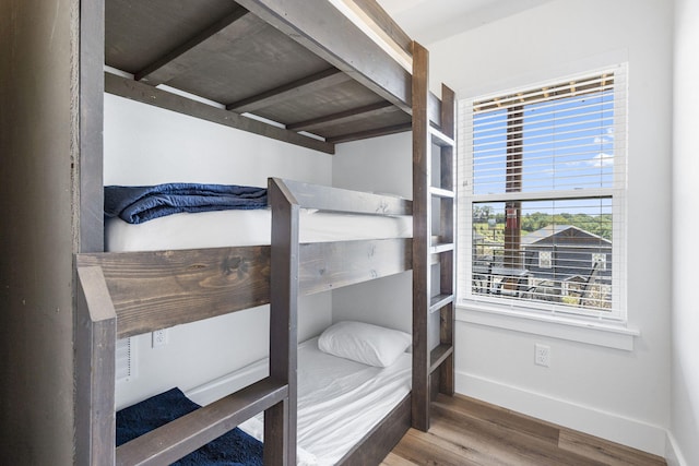 bedroom featuring hardwood / wood-style flooring