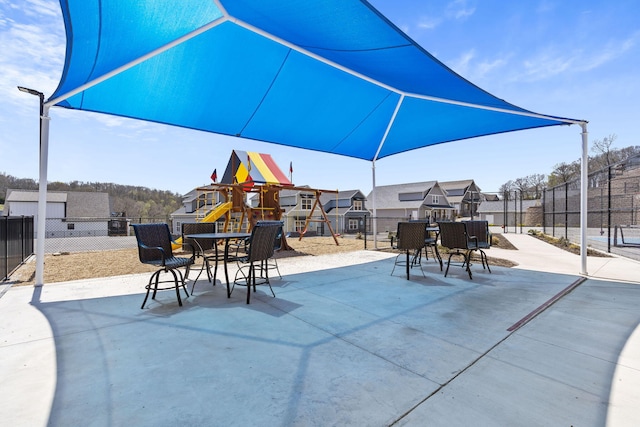 view of patio with a playground