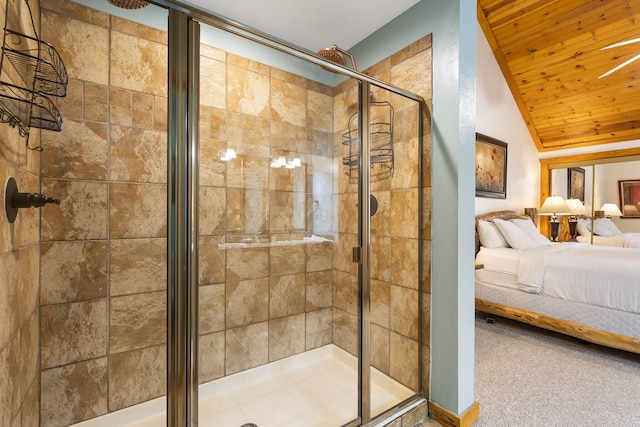 bathroom with an enclosed shower, wooden ceiling, and vaulted ceiling