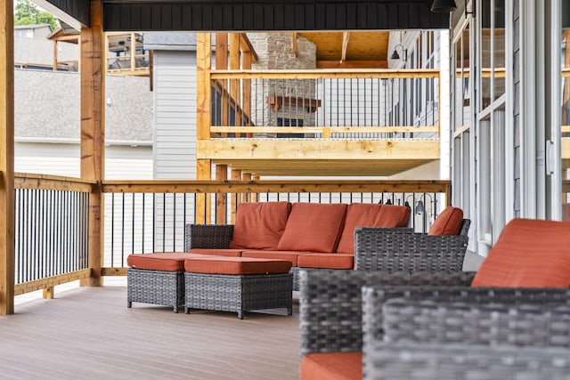 wooden deck with outdoor lounge area