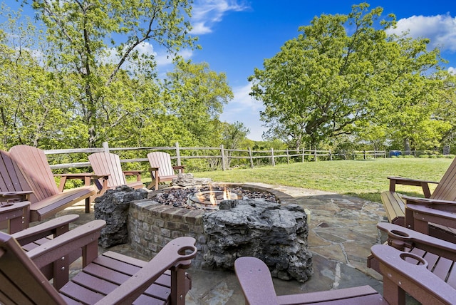 view of patio / terrace featuring a fire pit