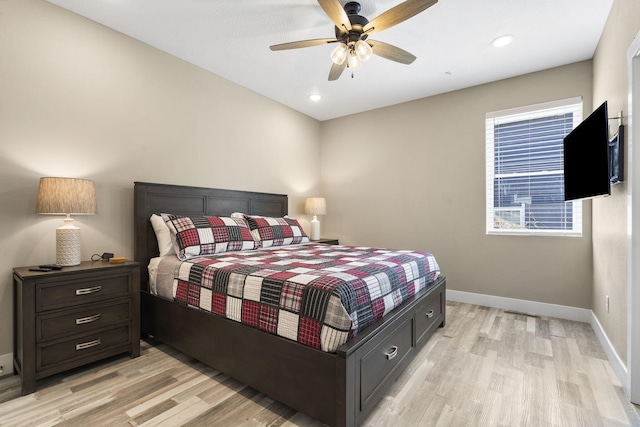 bedroom featuring recessed lighting, light wood finished floors, baseboards, and a ceiling fan