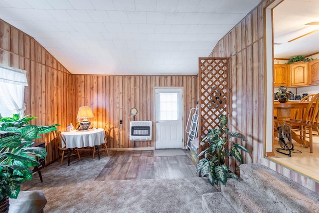 822 County Road 160, Fremont, MO 63941 - sitting room with carpet, wood walls, and heating unit