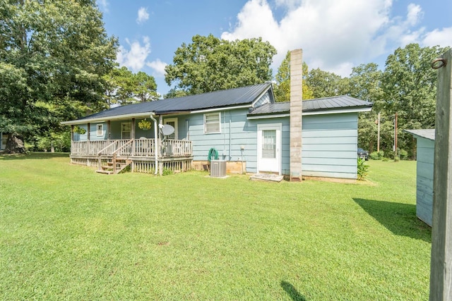822 County Road 160, Fremont, MO 63941 - rear view of property featuring a yard, a porch, a chimney, and metal roof
