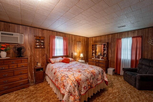 822 County Road 160, Fremont, MO 63941 - carpeted bedroom featuring an AC wall unit, wood walls, and visible vents