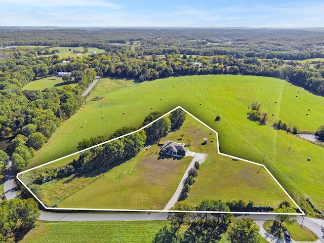 birds eye view of property featuring a rural view