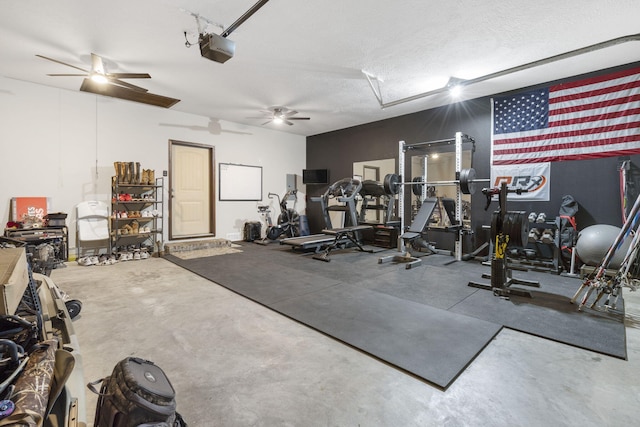 workout area featuring ceiling fan and a textured ceiling