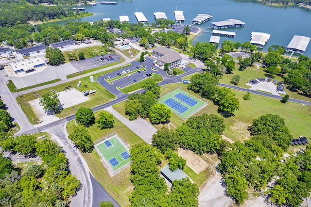 birds eye view of property with a water view