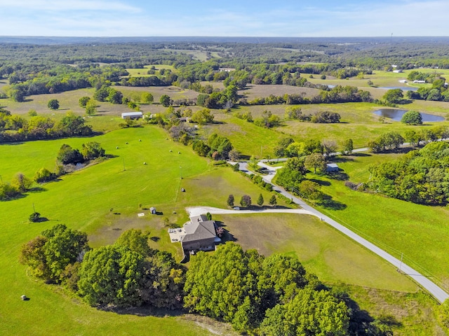 aerial view with a water view and a rural view