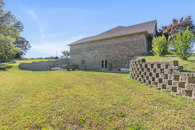 view of home's exterior featuring a lawn