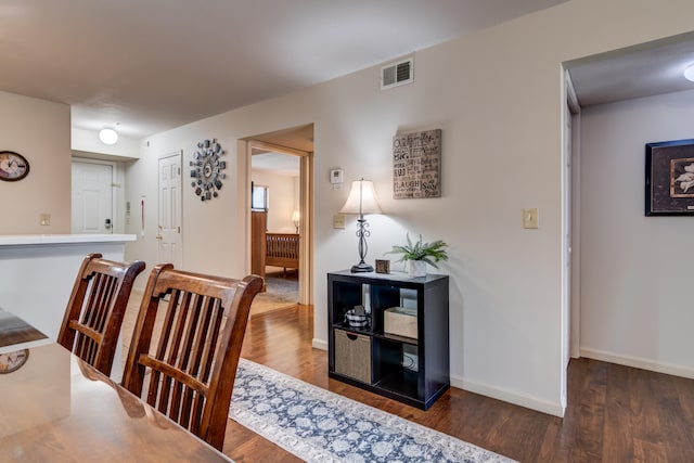 dining room featuring dark hardwood / wood-style flooring