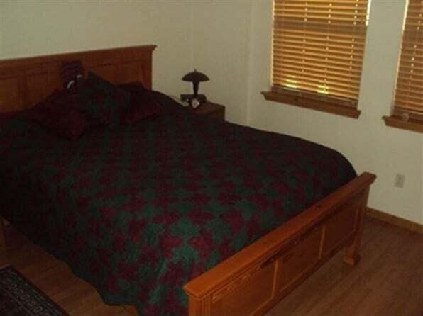 bedroom featuring wood-type flooring