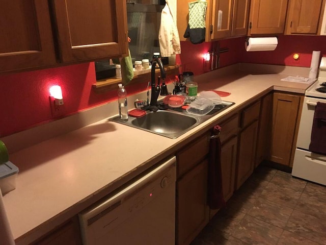 kitchen with sink, white range with electric cooktop, and dishwasher