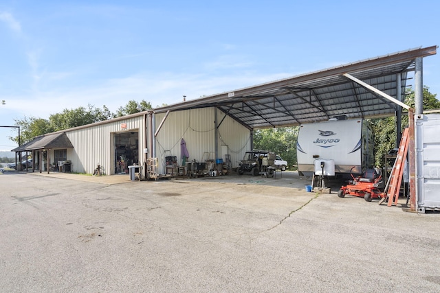 view of parking with a carport