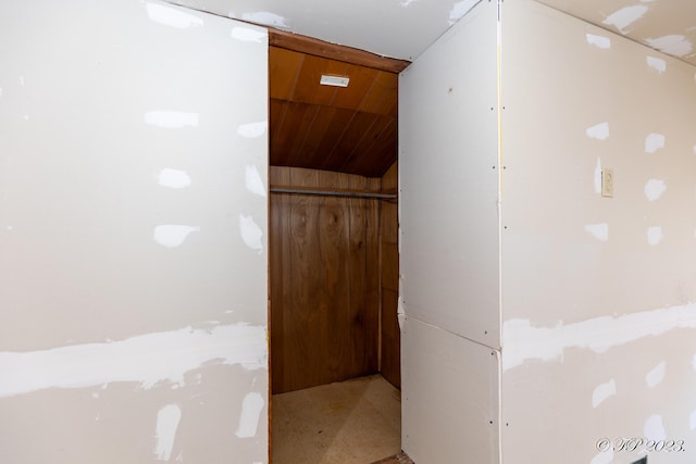 hallway featuring wood ceiling