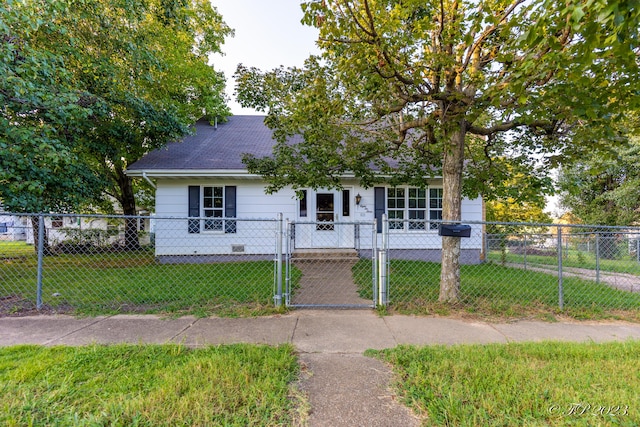 bungalow with a gate, crawl space, a front yard, and a fenced front yard