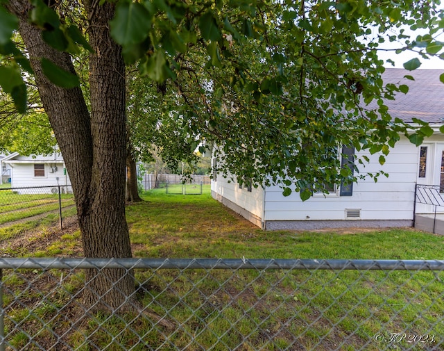 view of yard featuring fence