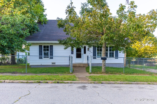 view of front facade with a fenced front yard