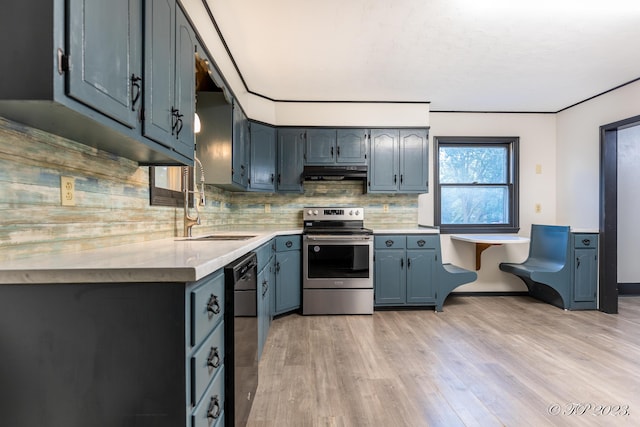 kitchen featuring under cabinet range hood, dishwasher, tasteful backsplash, light wood-style flooring, and stainless steel electric range oven