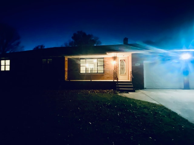 view of front of home with a garage