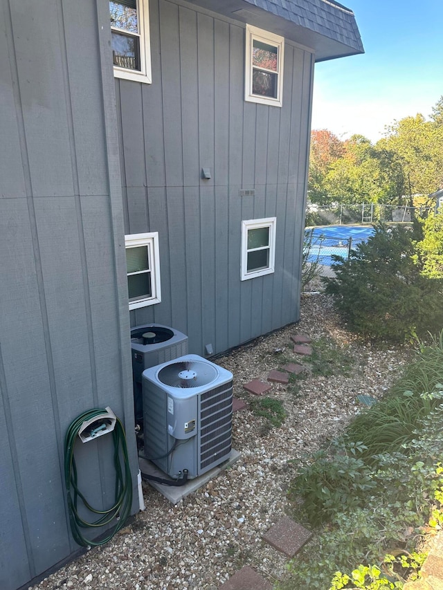 view of home's exterior with cooling unit