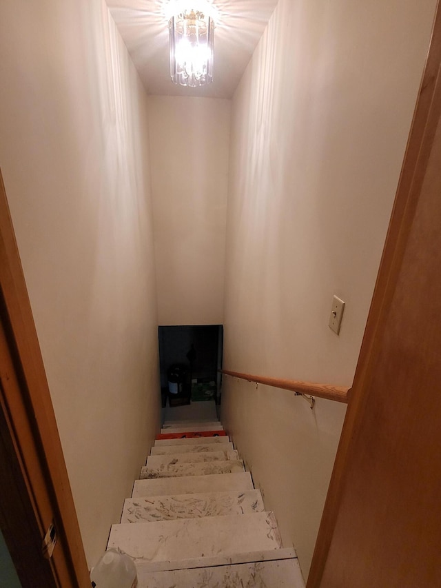 1201 Railey Creek Rd, Reeds Spring, MO 65737 - stairway featuring an inviting chandelier