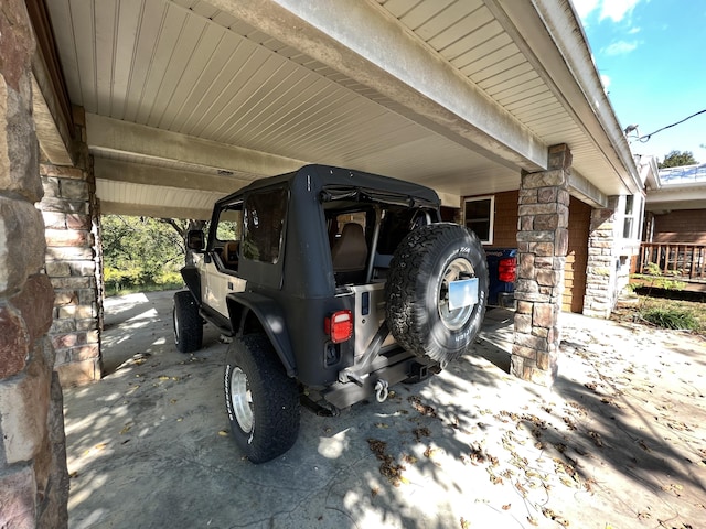 view of parking featuring a carport