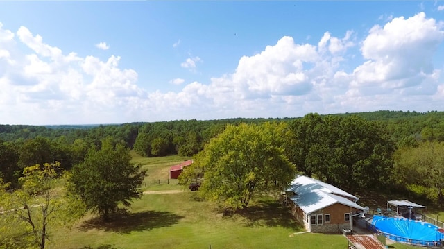 bird's eye view featuring a view of trees