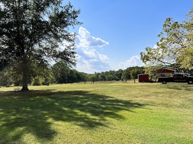 view of yard with an outdoor structure and an outbuilding