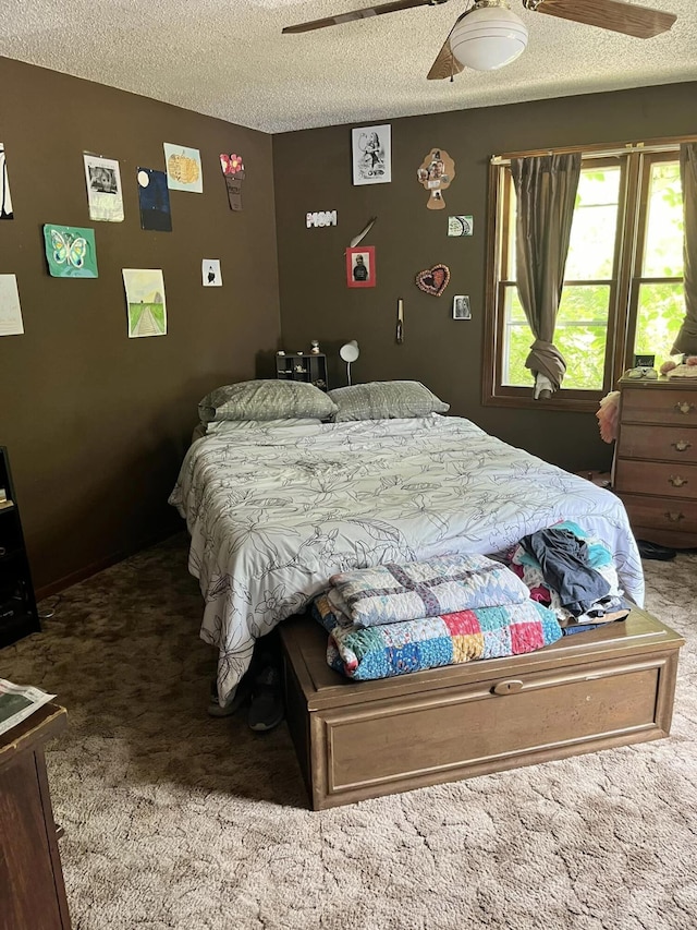 1100 Hattie Dr, Willow Springs, MO 65793 - carpeted bedroom featuring a textured ceiling and ceiling fan