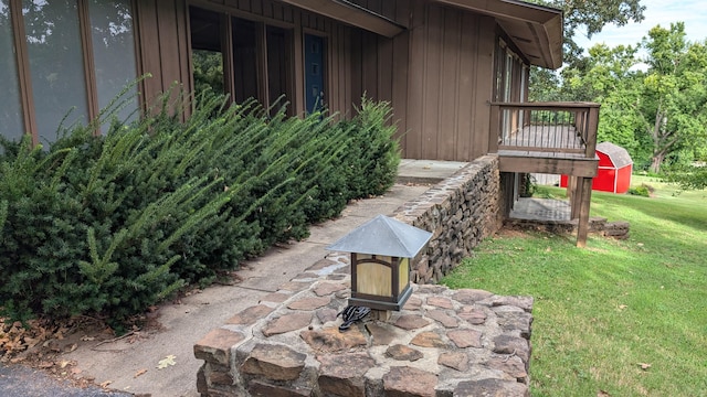 view of yard with a wooden deck