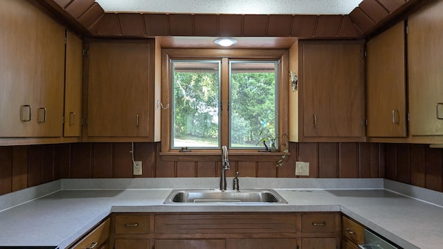 kitchen with sink and a textured ceiling