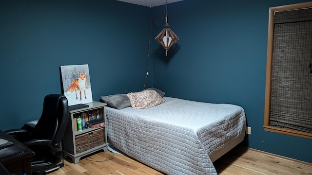 bedroom featuring light hardwood / wood-style floors