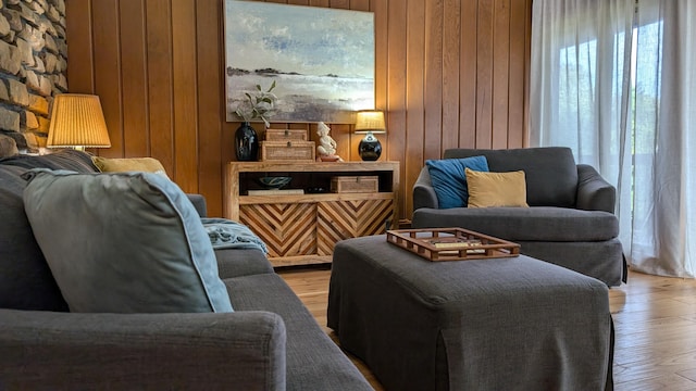 interior space with wood walls and hardwood / wood-style floors