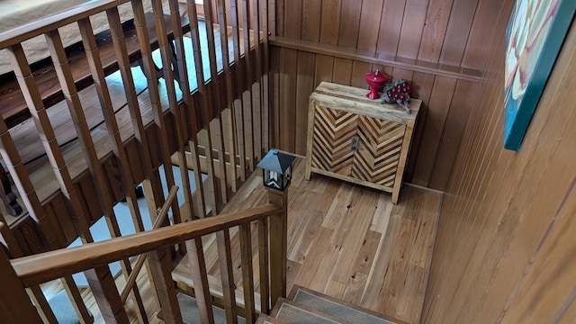 stairway with wooden walls