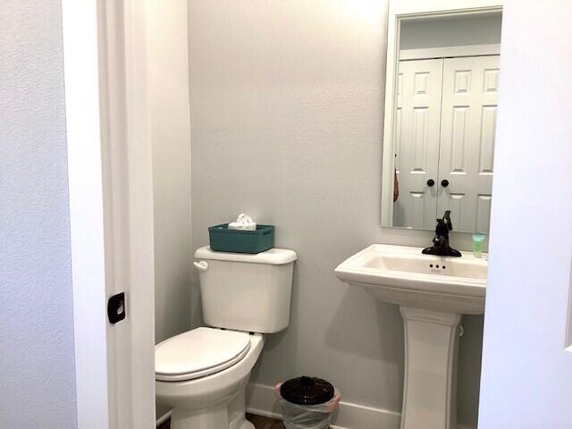 bathroom featuring toilet