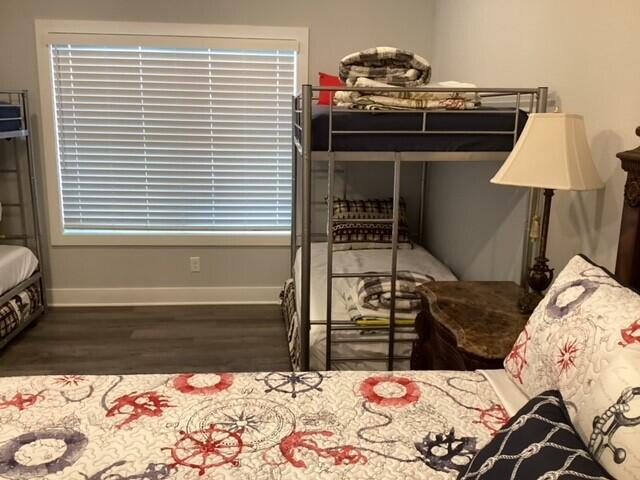 bedroom featuring dark hardwood / wood-style flooring