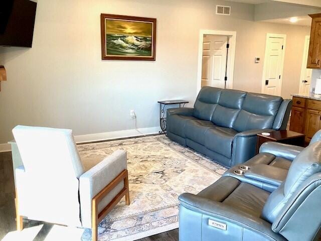 living room with hardwood / wood-style flooring