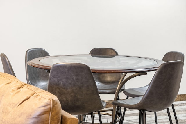 dining space featuring light wood-type flooring