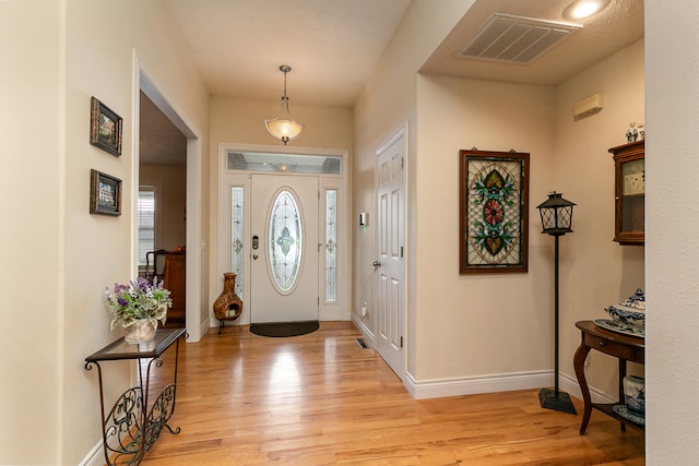 foyer featuring light wood-type flooring