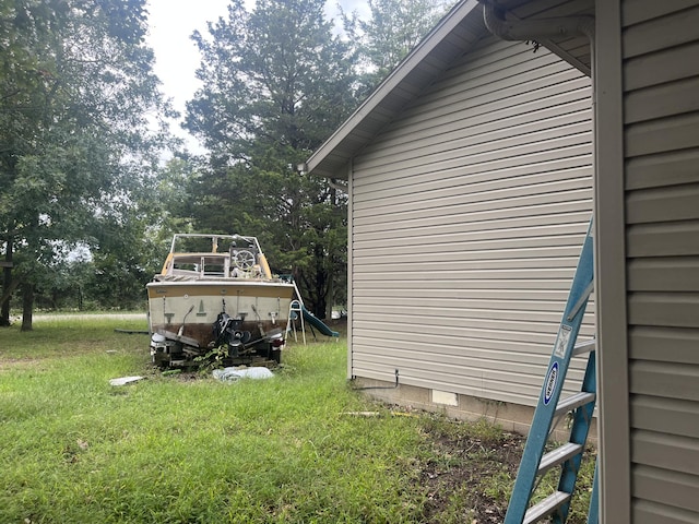 view of home's exterior featuring a lawn